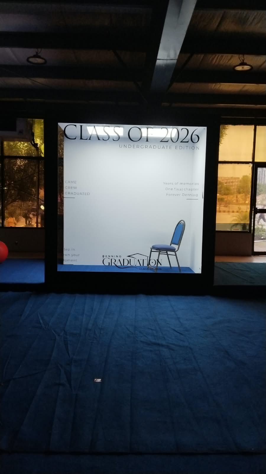 Class of 2026 branded photo display frame set up at Expo Centre Karachi for the Denning graduation ceremony